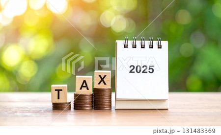 Important tax deadline reminders for 2025 with a calendar and coins 131483369