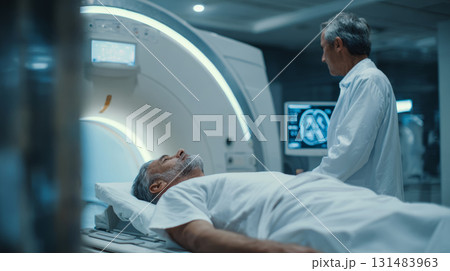 Elderly man hospital MRI doctor medical patient healthcare diagnosis scan technology Elderly man lying hospital bed during MRI scan doctor 131483963