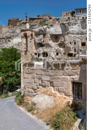 Cavusin Old Rock Mosque, or Cavusin Koyu Eski Kaya Camii, and ancient cave dwellings in Cavusin, Cappadocia, Turkey 131484294