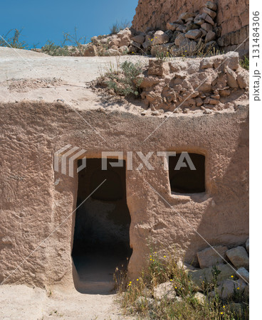 Ancient Rock-Cut Dwelling Entrance in Cappadocia, Nevsehir, Turkey 131484306