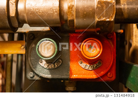 Start and stop buttons inside an old military submarine control panel 131484918