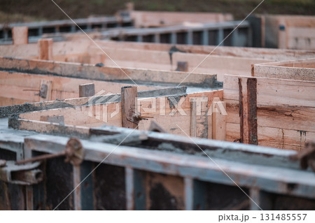 Construction of a concrete foundation for a house Construction of a concrete foundation for a house 131485557