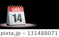 December 14 Calendar Spotlighted on Black Background 131488071