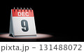 December 9 Calendar Spotlighted on Black Background 131488072