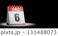 December 6 Calendar Spotlighted on Black Background 131488073