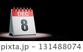 December 8 Calendar Spotlighted on Black Background 131488074