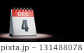 December 4 Calendar Spotlighted on Black Background 131488078