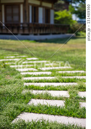 Traditional Korean houses and stone paths 131489360