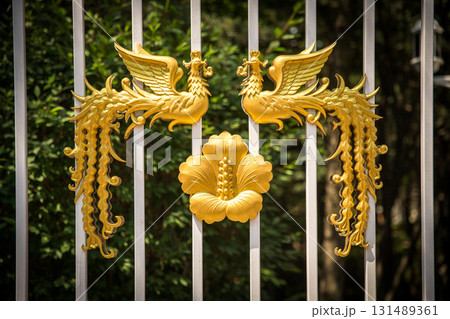 The golden phoenix pattern on the main gate of the Blue House in South Korea 131489361