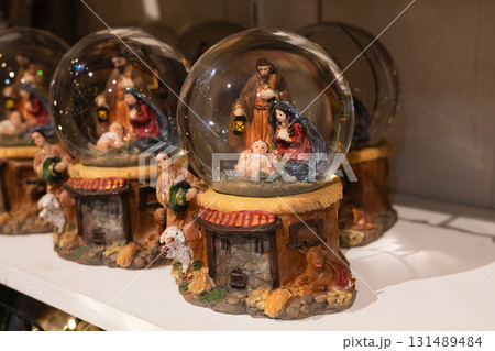 A glass balls with the Scene of the birth of Jesus Christ with Mary and Joseph A glass balls with the Scene of the birth of Jesus Christ with Mary and Joseph 131489484