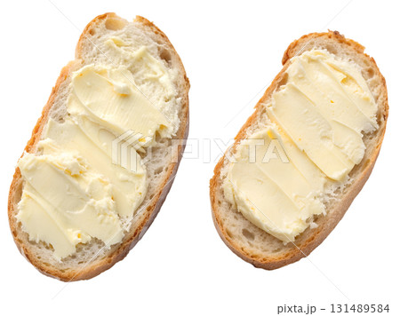 Slice of fresh bread with a pat of yellow butter melting on top, isolated on transparent background, breakfast food concept 131489584
