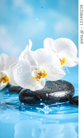 Zen spa still life with pink orchid, stones, and water for relaxation and wellness 131490239