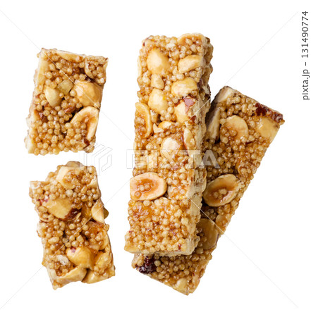 Granola bars with nuts cut out on a white. Top view Granola bars with nuts cut out on a white. Top view 131490774
