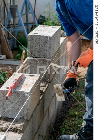 Handyman working on a construction site with tools Handyman working on a construction site with tools 131494120