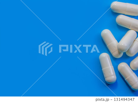 pills border over blue pills border over blue 131494347