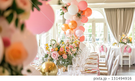 Birthday table decoration with sweets, flowers, candles and pink balloons. 131494916