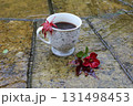 A cup of coffee outside on an autumn day  131498453