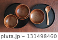 A composition of wooden bowls and plates  131498460