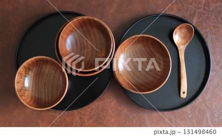 A composition of wooden bowls and plates A composition of wooden bowls and plates 131498460