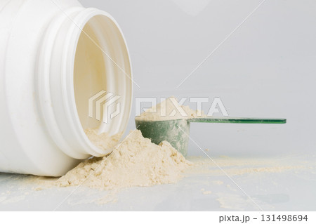 Protein Powder with Plastic Bottle on White Background Nutrition Photostock 131498694