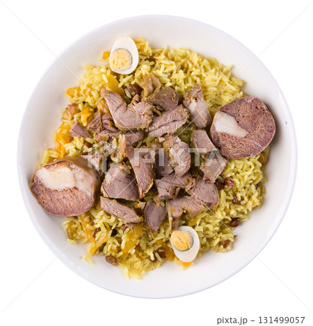 Isolated plate of pilaf with kazy and quail eggs 131499057