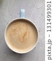 cup of coffee on concrete table, top view 131499301
