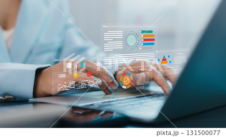 Businesswoman using laptop with data analytics dashboard and digital business report visualization Businesswoman using laptop with data analytics dashboard and digital business report visualization 131500077