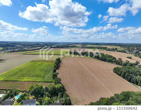 Aerial view of farmland surrounded by forest in the Belgian province of Walloon Brabant. Aerial view of farmland surrounded by forest in the Belgian province of Walloon Brabant. 131500642
