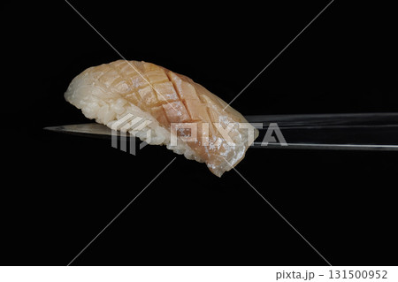 pieces of delicious japanese sushi on a black background pieces of delicious japanese sushi on a black background 131500952