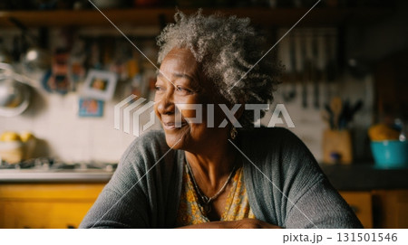 Elderly Woman Smiling In Cozy Kitchen Setting. Reflects Warmth And Contentment In Home Environment 131501546