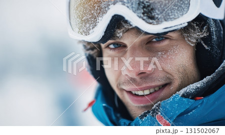 Smiling Man Wearing Ski Goggles In Snowy Environment. Winter Sports And Outdoor Adventure Smiling Man Wearing Ski Goggles In Snowy Environment. Winter Sports And Outdoor Adventure 131502067