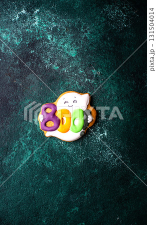 Halloween cookies in shape of ghost, jack-o-lantern and skull 131504014
