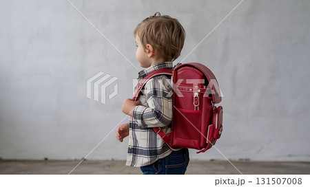 Young Child with Red Backpack Facing Away 131507008