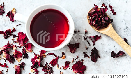 Rose Tea with Dried Petals on a Light Surface 131507103
