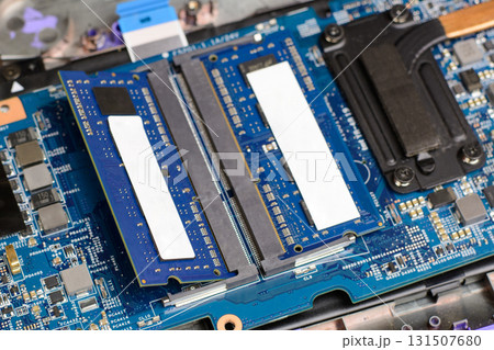 Two new RAM memory chips in the motherboard of a modern laptop. Upgrading personal computer 131507680