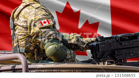 Canada flag with soldier at machinegun turret 131508655