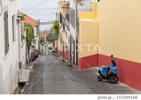 Funchal, Madeira, Portugal. A narrow street perspective 131509166