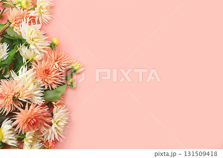Frame of dahlia flowers, abstract floral arrangement, spring or autumn background with place for text, minimal holiday concept, still life, greeting card. selective focus Frame of dahlia flowers, abstract floral arrangement, spring or autumn background with place for text, minimal holiday concept, still life, greeting card. selective focus 131509418