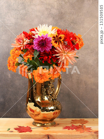 Beautiful dahlia flowers in a vase, abstract floral arrangement, autumn background with space for text, minimal holiday concept, still life, postcard. Happy birthday, wedding, selective focus 131509585