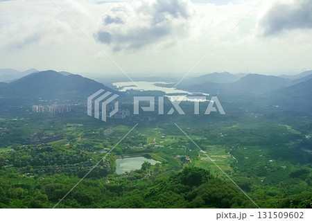 View of the beautiful jungle depths of Yanoda Park on Hainan Island, China. 131509602