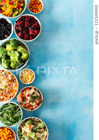 Various frozen veggies such as peas, carrots, and beans preserved in plates, a fresh and practical solution for winter meal preparation and healthy living, vegetables in plates on a blue background Various frozen veggies such as peas, carrots, and beans preserved in plates, a fresh and practical solution for winter meal preparation and healthy living, vegetables in plates on a blue background 131509993