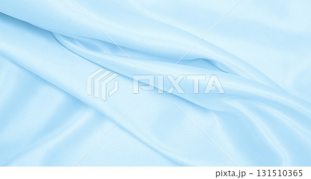 Smooth elegant blue silk or satin luxury cloth texture as abstract background. Luxurious background design Smooth elegant blue silk or satin luxury cloth texture as abstract background. Luxurious background design 131510365