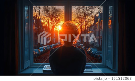 Person watching sunset from window cityscape view Person watching sunset from window cityscape view 131512068