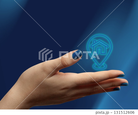 Property search and rental concept with house icon. Blue background Property search and rental concept with house icon. Blue background 131512606