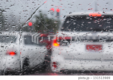 car on highway road with rainny season, blurred image 131513989