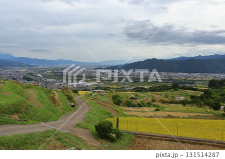 姨捨 秋の善光寺平風景（棚田駐車場） 131514287