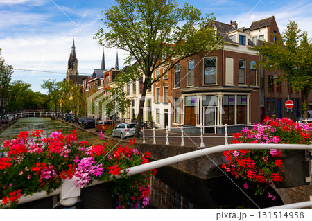 Streets along canal of Delft, Netherlands 131514958