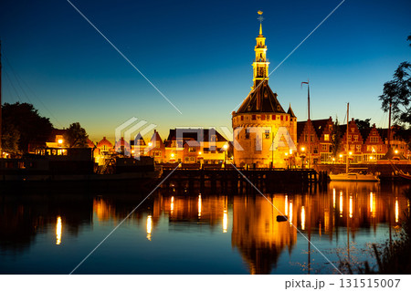 Night view of illuminated Hoofdtoren tower in Hoorn city port on lake Markermeer 131515007
