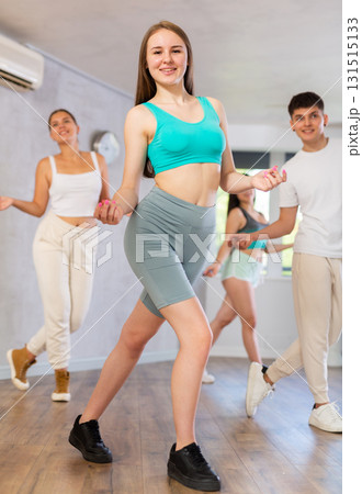Group of young women and young guy dancing jazz funk 131515133