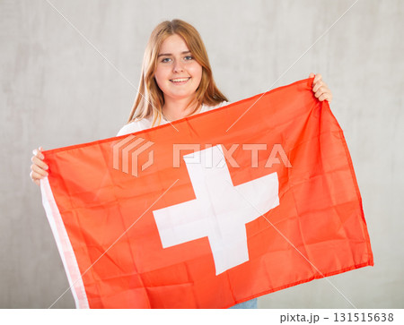 Happy girl supporting Switzerland on world championship Happy girl supporting Switzerland on world championship 131515638